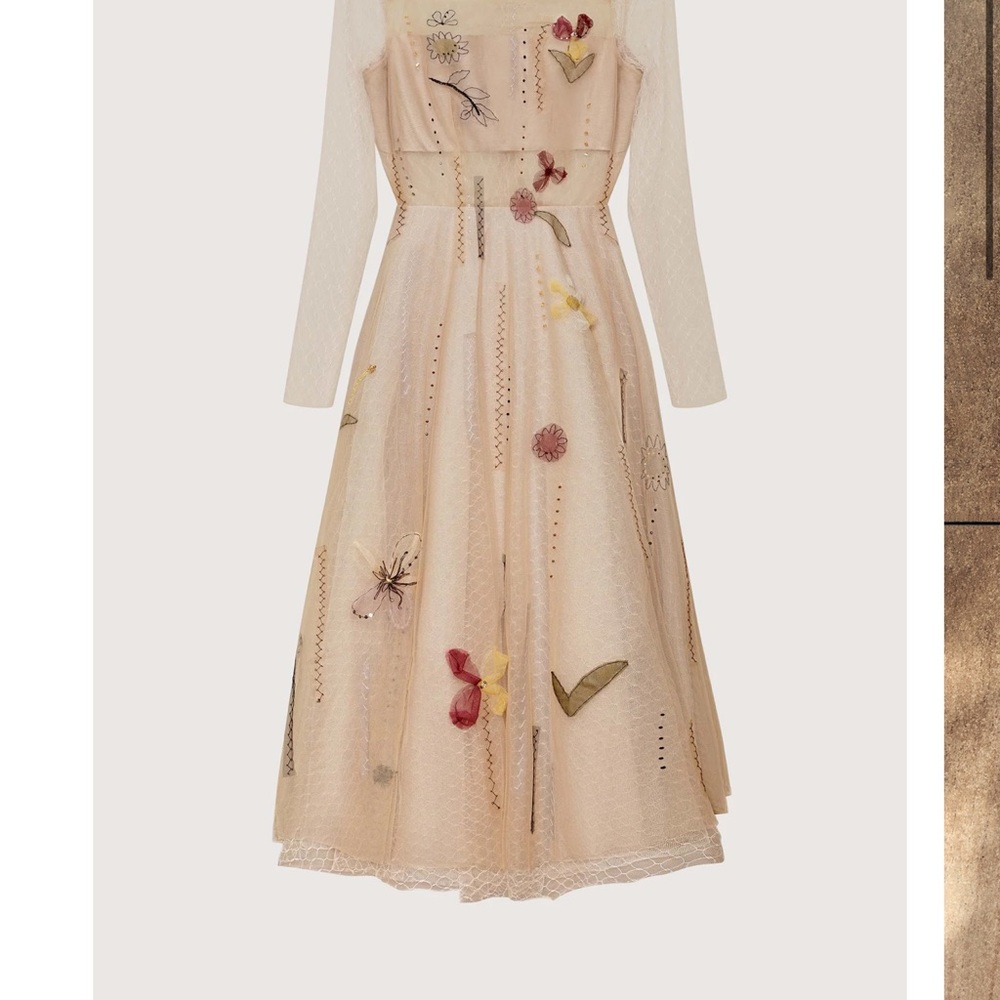 In search of this Elegant Floral Embroidered Cream Dress